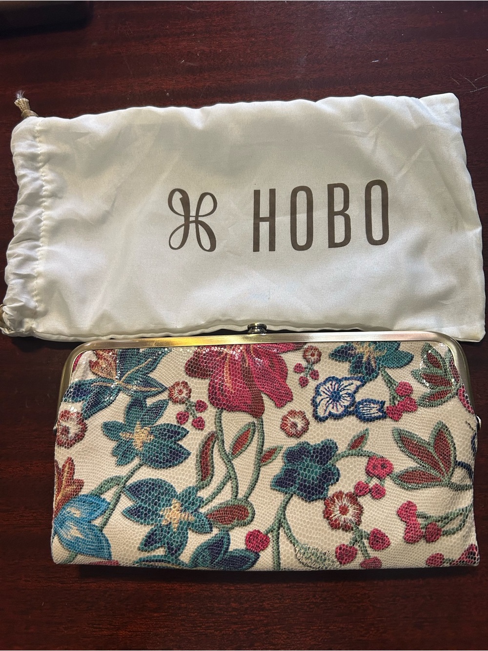 HOBO Floral Multicolor Embossed Clutch in Cream